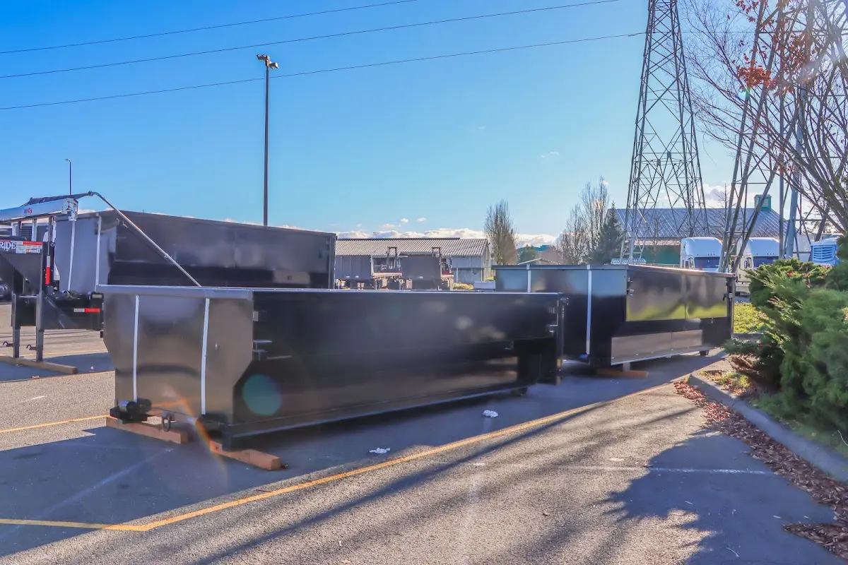 Roll-off dumpster ready for waste disposal at job site for Construction Dumpster Rental in Firestone